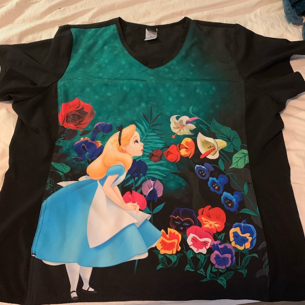 Alice in wonderland scrub top . In good condition !